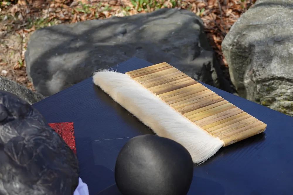 Brush and pad, turned
